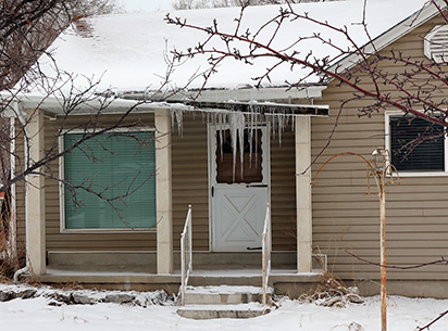 House in need of a gutter heat trace system.